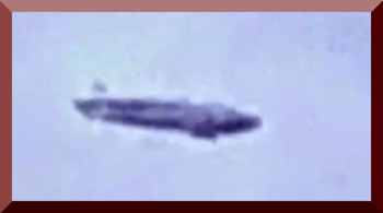 Stationary Cigar Shaped UFO